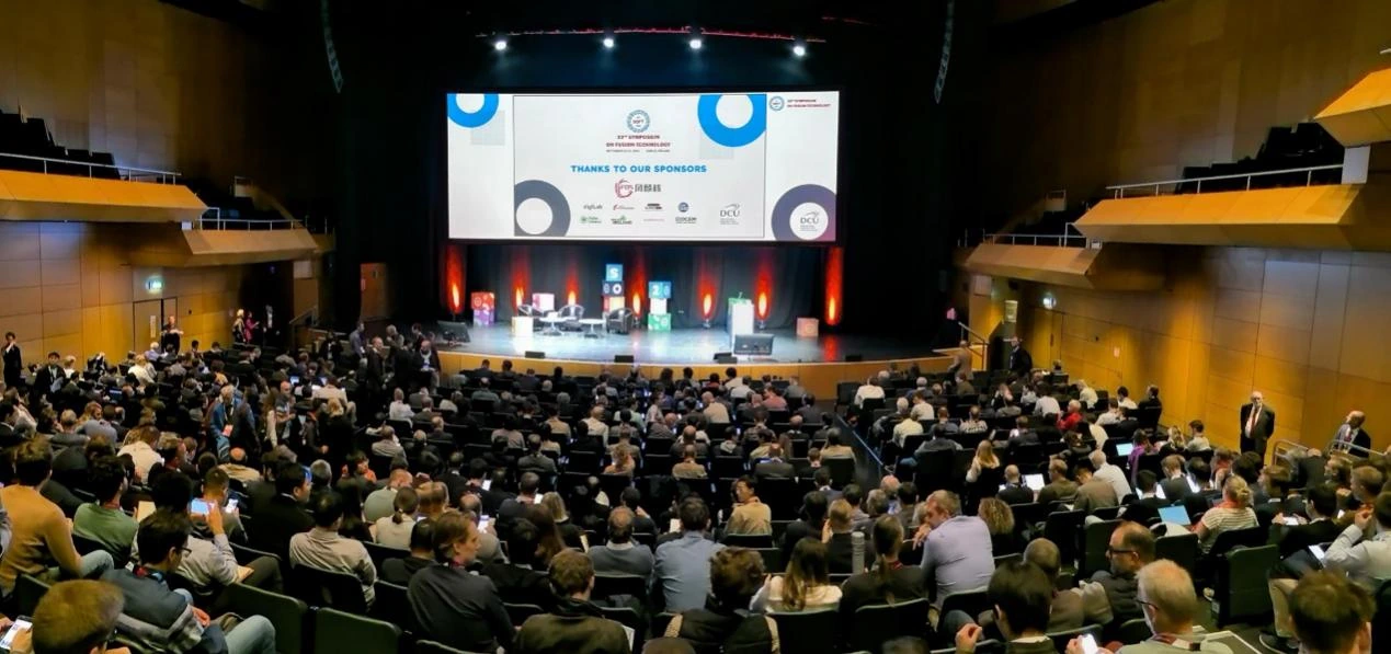 Plenary hall of the 33rd Symposium on Fusion Technology in Dublin, with the FDS logo first on the sponsor screen